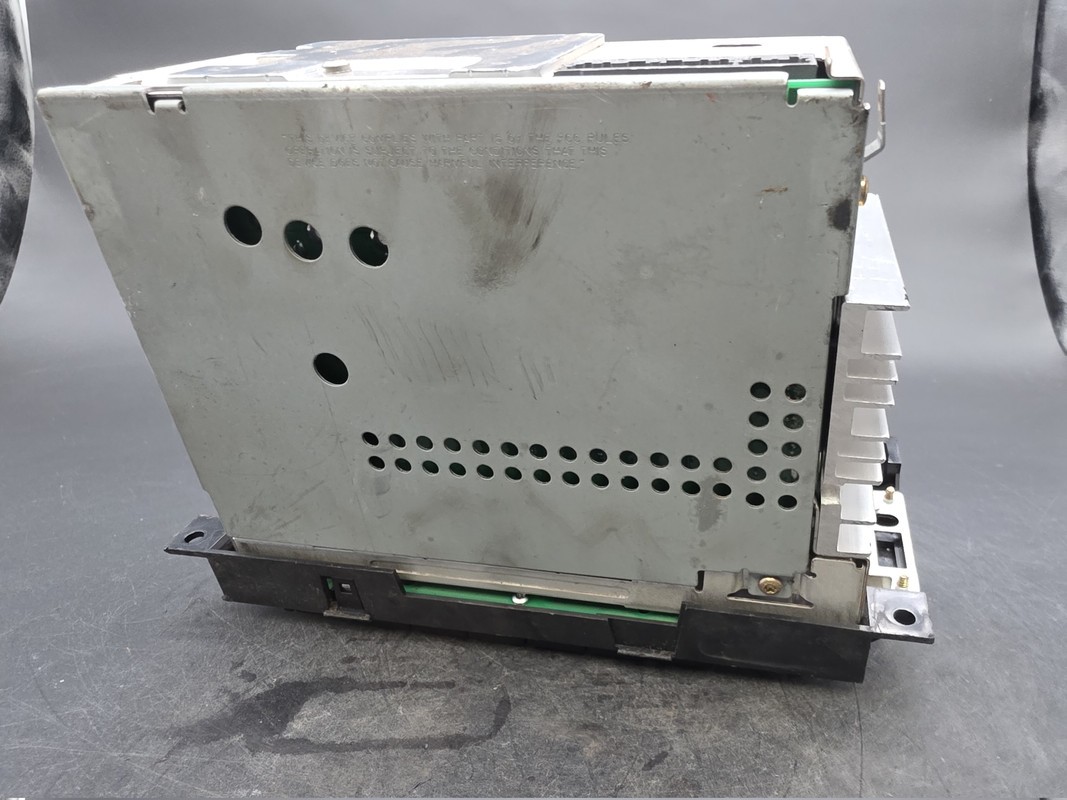 OEM 04-10 Chrysler Dodge Jeep Radio CD AUX Input 05064171AF Used
