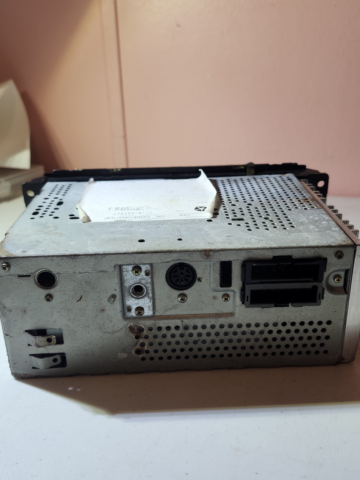 OEM Daimler Chrysler car radio with a CD player, specifically a model