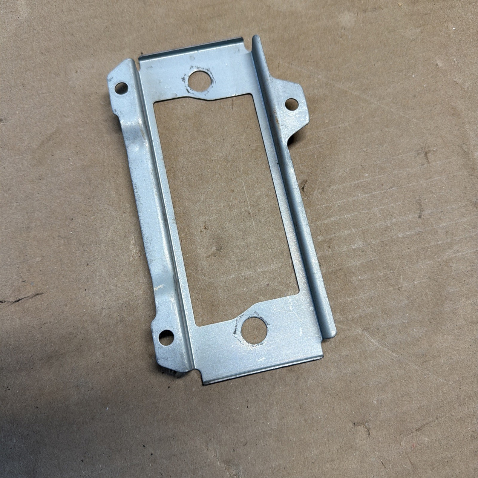 1985-1986 Dodge D50 Pickup Truck Radio/stereo Mount Plate. Two Knob OEM part