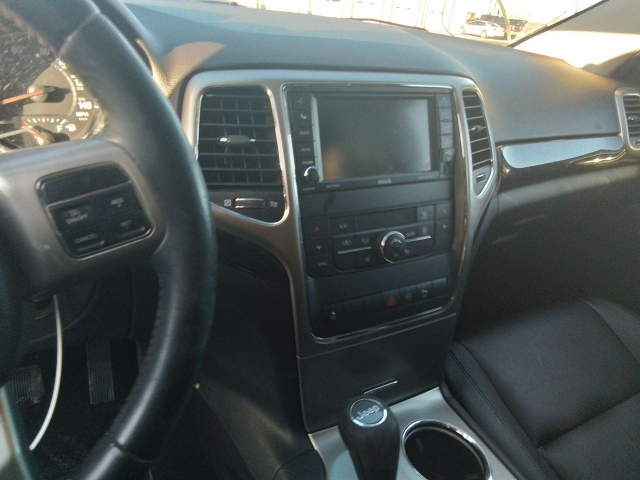 2012 Jeep Grand Cherokee Radio Receiver Face Plate ID RHB