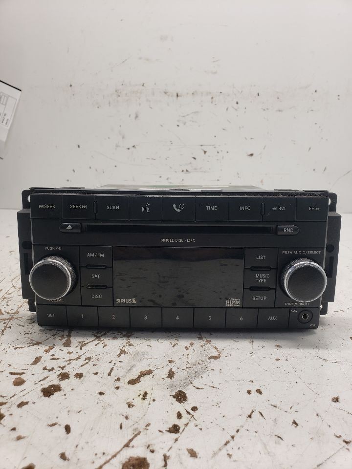 2008-2010 Dodge Dakota Radio AM FM CD-MP3 Face Plate ID RES OEM 1370854