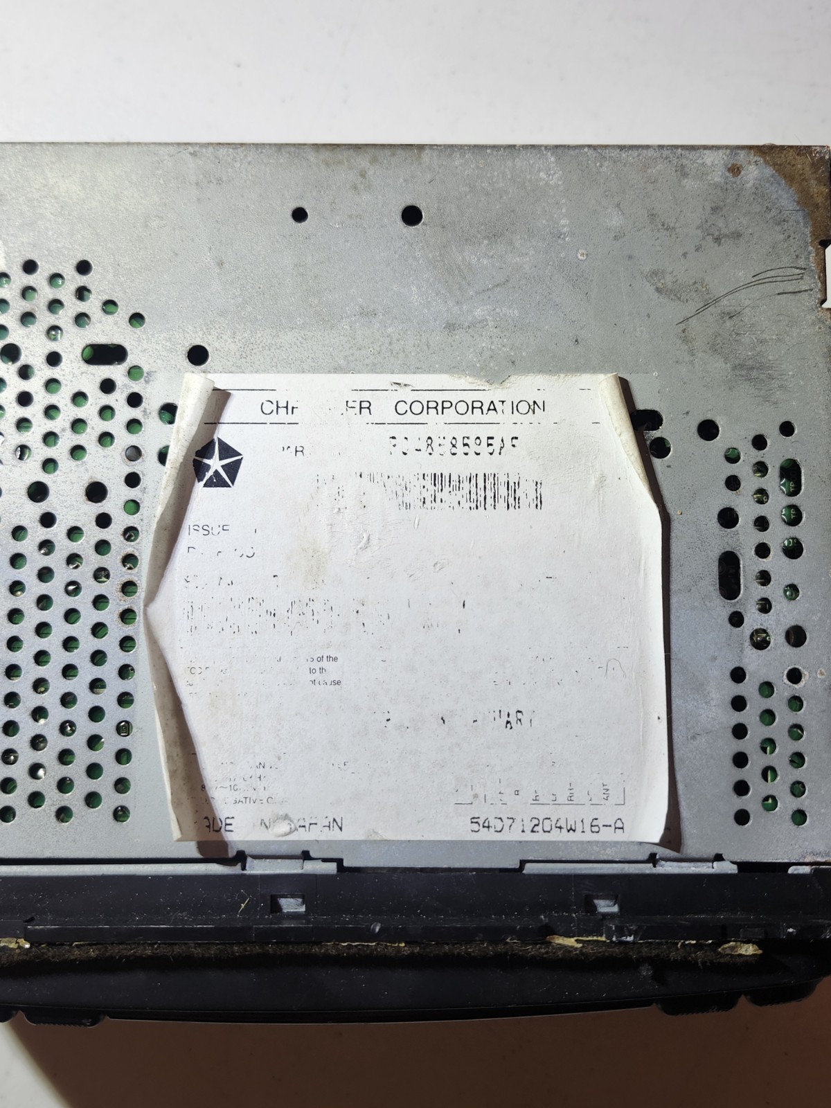 OEM Daimler Chrysler car radio with a CD player, specifically a model