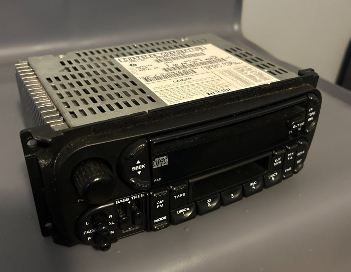 USED OEM RADIO FOR 02-07 DODGE CHRYSLER JEEP CD /CASSETTE/ AM FM P05064042AA