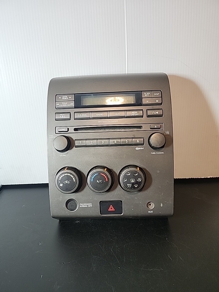 2004 – 2007 Nissan Titan Radio CD Player Climate Control Hazard Aux Dash 07 OEM