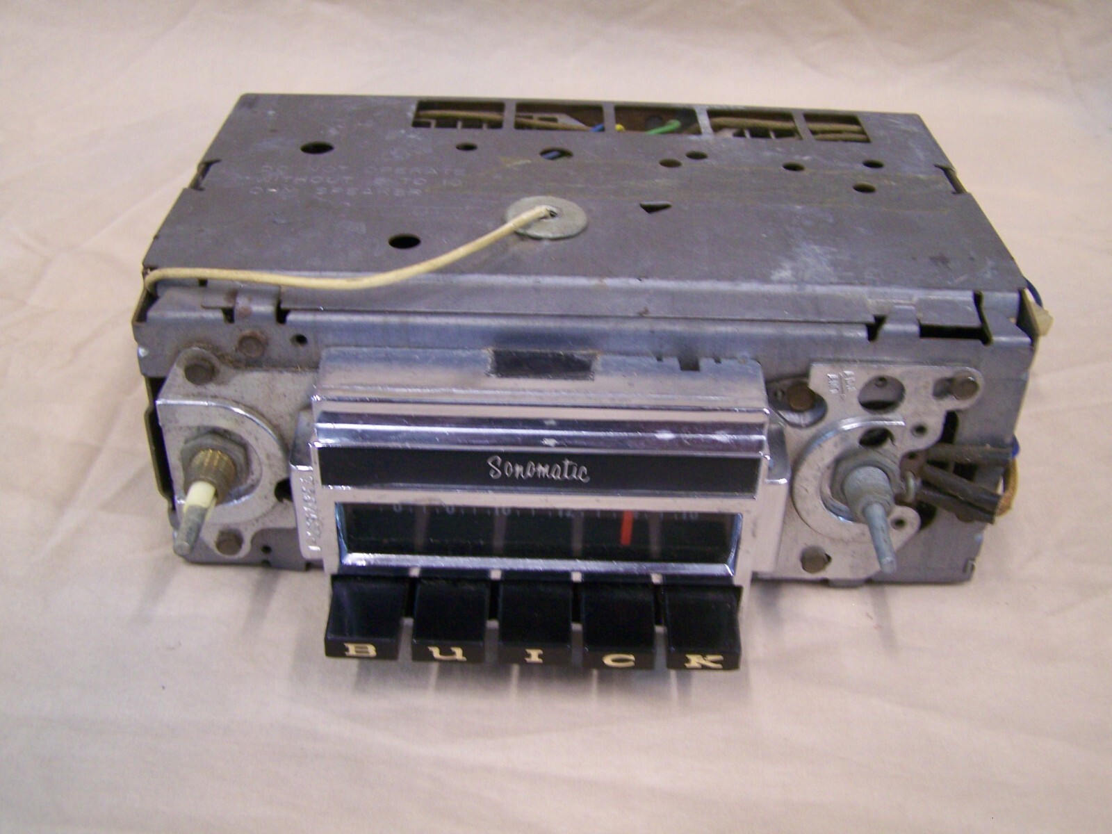 Buick 1969 AM Radio # 94BPB2 W/ Nice Face Chrome in Unknown Condition