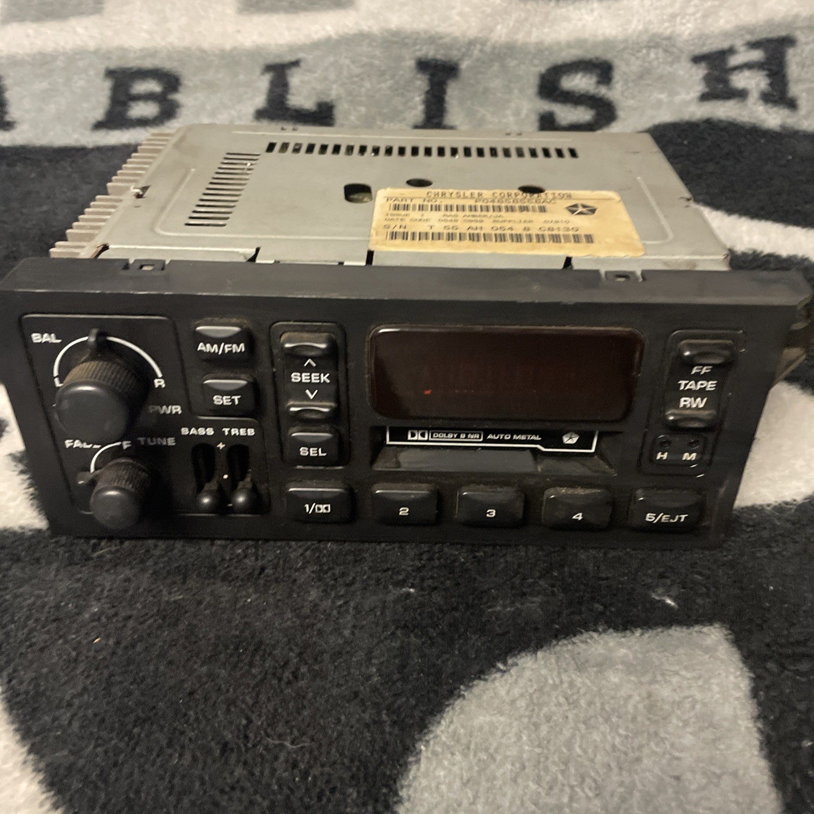 OEM Chrysler Dodge Jeep Infinity AM/FM Cassette Radio P04858558AC – NOS Untested