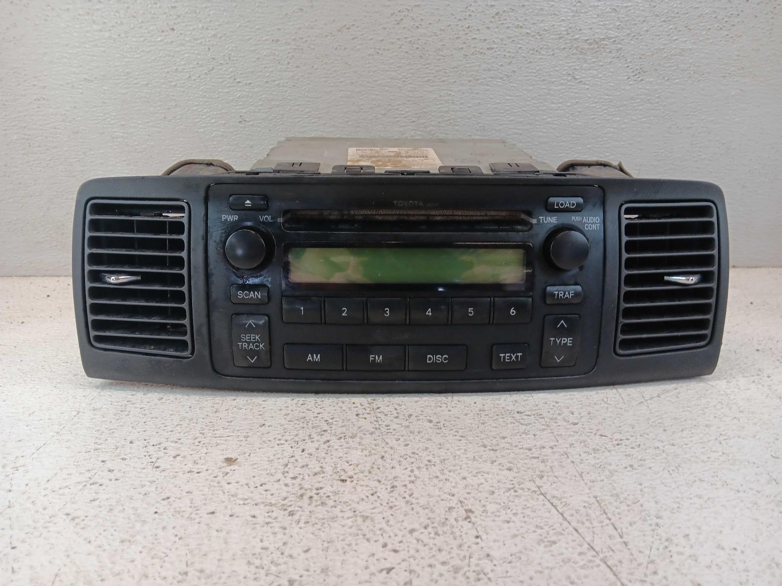 04-08 Toyota Corolla Radio Receiver ID A51813 Radio Face *May Need Programming*