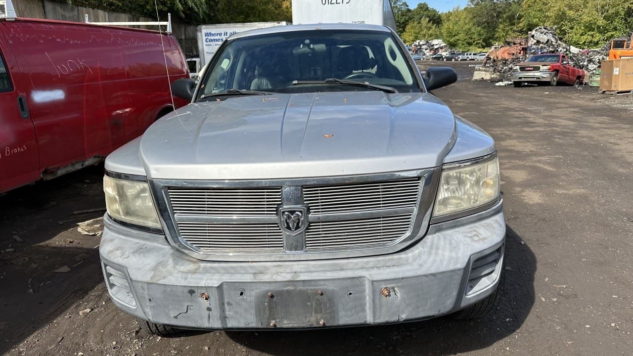 2008-2010 Dodge Dakota Radio AM FM CD-MP3 Face Plate ID RES OEM 1412321