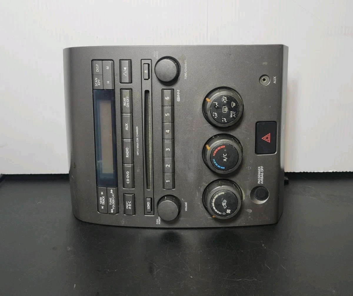 2004 – 2007 Nissan Titan Radio CD Player Climate Control Hazard Aux Dash 07 OEM