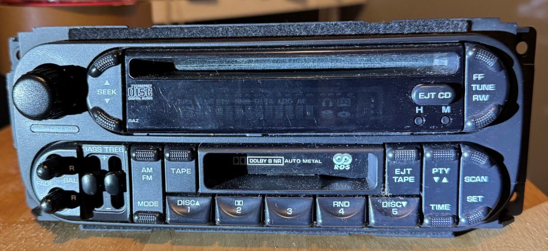USED OEM RADIO FOR 02-07 DODGE CHRYSLER JEEP CD /CASSETTE/ AM FM P05064042AA
