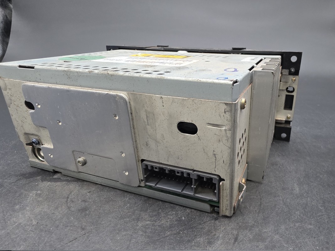 OEM 04-10 Chrysler Dodge Jeep Radio CD AUX Input 05064171AF Used