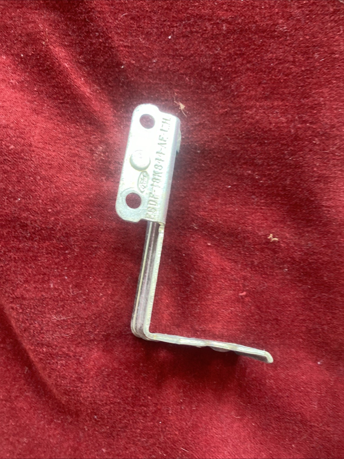OEM 1986 Ford radio mount bracket support LH